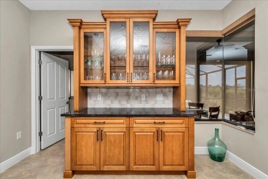 This thoughtfully expanded Jacaranda model offers 4 bedrooms, 3 on Summerglen Country Club in Florida - for sale on GolfHomes.com, golf home, golf lot