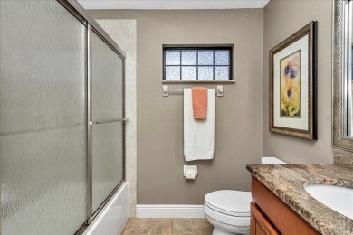 This thoughtfully expanded Jacaranda model offers 4 bedrooms, 3 on Summerglen Country Club in Florida - for sale on GolfHomes.com, golf home, golf lot