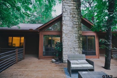 Welcome to this charming home nestled within the private, gated on Holly Lake Ranch Golf Club in Texas - for sale on GolfHomes.com, golf home, golf lot