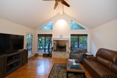 Welcome to this charming home nestled within the private, gated on Holly Lake Ranch Golf Club in Texas - for sale on GolfHomes.com, golf home, golf lot