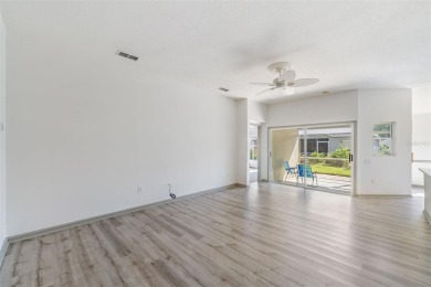 Welcome to your dream home in the highly sought-after, gated on Lexington Oaks Golf Club in Florida - for sale on GolfHomes.com, golf home, golf lot
