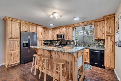 ON THE GOLF COURSE!  Check out the photos.  This is an on Stansbury Park Golf Club in Utah - for sale on GolfHomes.com, golf home, golf lot