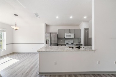 Welcome to your dream home in the highly sought-after, gated on Lexington Oaks Golf Club in Florida - for sale on GolfHomes.com, golf home, golf lot