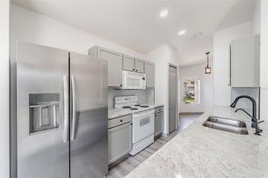 Welcome to your dream home in the highly sought-after, gated on Lexington Oaks Golf Club in Florida - for sale on GolfHomes.com, golf home, golf lot