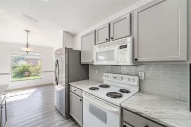 Welcome to your dream home in the highly sought-after, gated on Lexington Oaks Golf Club in Florida - for sale on GolfHomes.com, golf home, golf lot