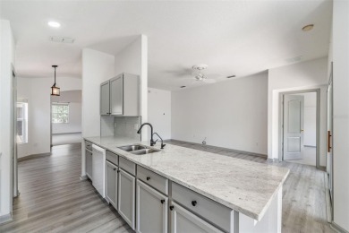 Welcome to your dream home in the highly sought-after, gated on Lexington Oaks Golf Club in Florida - for sale on GolfHomes.com, golf home, golf lot