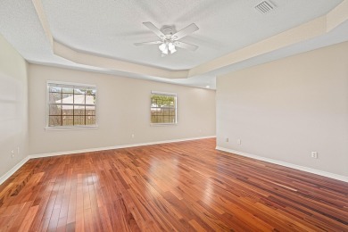 Welcome Home to this amazing all-brick Bluewater Bay home on Fairway Oaks at Magnolia Golf Course in Florida - for sale on GolfHomes.com, golf home, golf lot