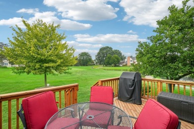 Stunning golf course, pond, and bridge views surround this on Bushwood Golf Club in Michigan - for sale on GolfHomes.com, golf home, golf lot