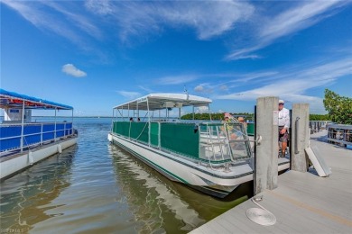 Welcome to this beautifully updated 3-bedroom, 2-bathroom lake on Pelicans Nest Golf Club in Florida - for sale on GolfHomes.com, golf home, golf lot