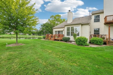 Stunning golf course, pond, and bridge views surround this on Bushwood Golf Club in Michigan - for sale on GolfHomes.com, golf home, golf lot