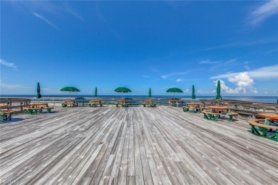 Welcome to this beautifully updated 3-bedroom, 2-bathroom lake on Pelicans Nest Golf Club in Florida - for sale on GolfHomes.com, golf home, golf lot