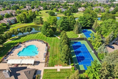 Stunning golf course, pond, and bridge views surround this on Bushwood Golf Club in Michigan - for sale on GolfHomes.com, golf home, golf lot