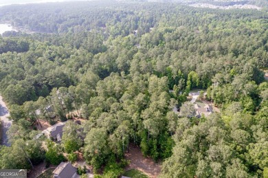 Come and discover this beautiful homesite located in the secure on Reynolds Lake Oconee - The Landing in Georgia - for sale on GolfHomes.com, golf home, golf lot