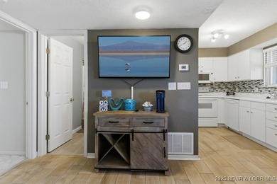 PRICED TO SELL. Per the condominium association, no rentals of on Tan-Tar-A Golf Club in Missouri - for sale on GolfHomes.com, golf home, golf lot