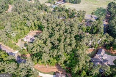 Come and discover this beautiful homesite located in the secure on Reynolds Lake Oconee - The Landing in Georgia - for sale on GolfHomes.com, golf home, golf lot