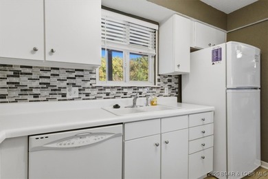 PRICED TO SELL. Per the condominium association, no rentals of on Tan-Tar-A Golf Club in Missouri - for sale on GolfHomes.com, golf home, golf lot