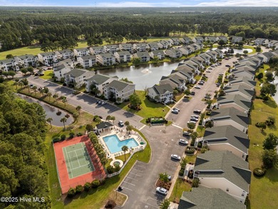 Start Your Summer in Sunset Beach! Furnished 2BR/2BA top-floor on Sandpiper Bay Golf and Country Club in North Carolina - for sale on GolfHomes.com, golf home, golf lot