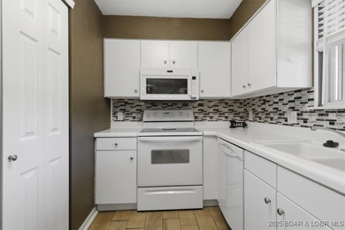 PRICED TO SELL. Per the condominium association, no rentals of on Tan-Tar-A Golf Club in Missouri - for sale on GolfHomes.com, golf home, golf lot