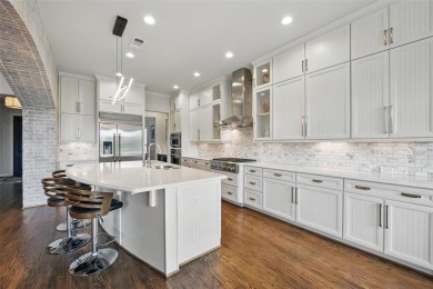 Situated directly on the 5th green, this luxury residence offers on Wildhorse Golf Club of Robson Ranch in Texas - for sale on GolfHomes.com, golf home, golf lot
