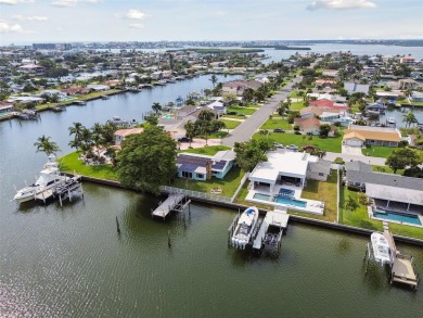 TOP WATERFRONT LOCATION ON AN OVERSIZED 100' WATERFRONT LOT WITH on Treasure Bay Golf and Tennis in Florida - for sale on GolfHomes.com, golf home, golf lot