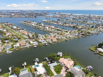 TOP WATERFRONT LOCATION ON AN OVERSIZED 100' WATERFRONT LOT WITH on Treasure Bay Golf and Tennis in Florida - for sale on GolfHomes.com, golf home, golf lot