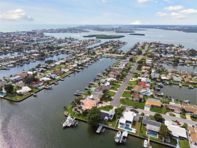 TOP WATERFRONT LOCATION ON AN OVERSIZED 100' WATERFRONT LOT WITH on Treasure Bay Golf and Tennis in Florida - for sale on GolfHomes.com, golf home, golf lot