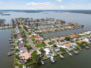 TOP WATERFRONT LOCATION ON AN OVERSIZED 100' WATERFRONT LOT WITH on Treasure Bay Golf and Tennis in Florida - for sale on GolfHomes.com, golf home, golf lot