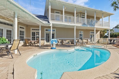 Coastal elegance meets effortless living at 196 Avalon Blvd in on Seascape Golf Course in Florida - for sale on GolfHomes.com, golf home, golf lot