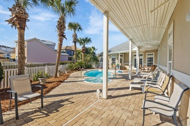 Coastal elegance meets effortless living at 196 Avalon Blvd in on Seascape Golf Course in Florida - for sale on GolfHomes.com, golf home, golf lot