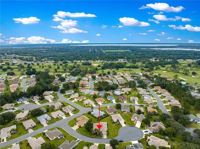 Luxurious Hampton model boasts French glass double French doors on Eagle Ridge At Spruce Creek Country Club in Florida - for sale on GolfHomes.com, golf home, golf lot