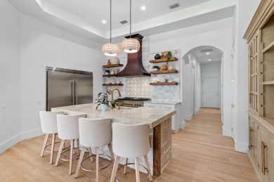 Welcome to 465 Captains Circle, a beautifully renovated on Regatta Bay Golf and Country Club in Florida - for sale on GolfHomes.com, golf home, golf lot