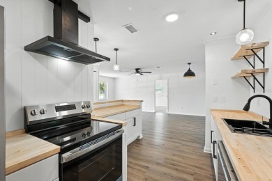 This beautifully updated 2-bed, 2-bath home offers 1,036 sq ft on St. Augustine Shores Golf Club in Florida - for sale on GolfHomes.com, golf home, golf lot