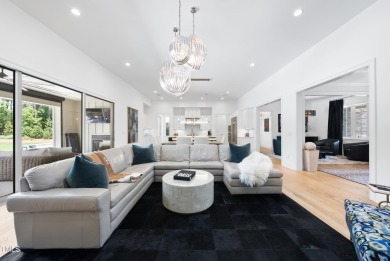 Experience luxury and lifestyle in this exceptional 5-bedroom, 5 on Hasentree Club in North Carolina - for sale on GolfHomes.com, golf home, golf lot