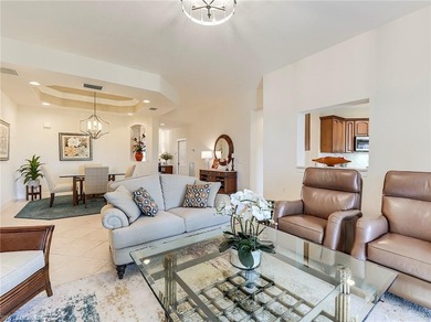 This beautifully maintained corner coach home features the on The Colony Golf and Country Club in Florida - for sale on GolfHomes.com, golf home, golf lot