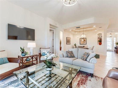 This beautifully maintained corner coach home features the on The Colony Golf and Country Club in Florida - for sale on GolfHomes.com, golf home, golf lot