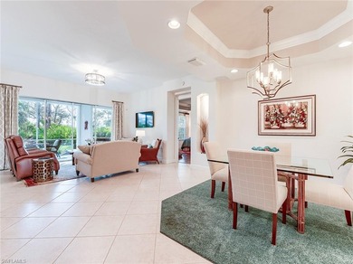 This beautifully maintained corner coach home features the on The Colony Golf and Country Club in Florida - for sale on GolfHomes.com, golf home, golf lot