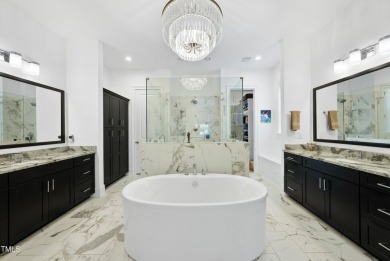 Experience luxury and lifestyle in this exceptional 5-bedroom, 5 on Hasentree Club in North Carolina - for sale on GolfHomes.com, golf home, golf lot