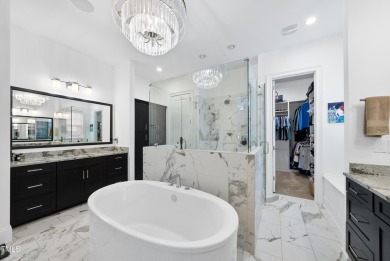 Experience luxury and lifestyle in this exceptional 5-bedroom, 5 on Hasentree Club in North Carolina - for sale on GolfHomes.com, golf home, golf lot