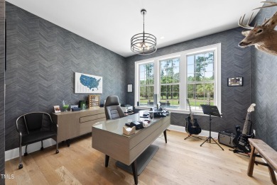 Experience luxury and lifestyle in this exceptional 5-bedroom, 5 on Hasentree Club in North Carolina - for sale on GolfHomes.com, golf home, golf lot