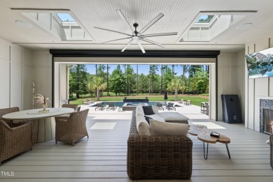 Experience luxury and lifestyle in this exceptional 5-bedroom, 5 on Hasentree Club in North Carolina - for sale on GolfHomes.com, golf home, golf lot