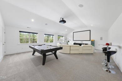 Experience luxury and lifestyle in this exceptional 5-bedroom, 5 on Hasentree Club in North Carolina - for sale on GolfHomes.com, golf home, golf lot