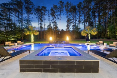 Experience luxury and lifestyle in this exceptional 5-bedroom, 5 on Hasentree Club in North Carolina - for sale on GolfHomes.com, golf home, golf lot