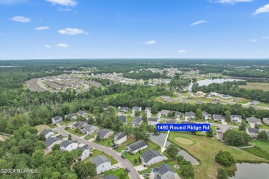 Looking for one level living with a community of amenities to on Lennon Hills Golf Course in North Carolina - for sale on GolfHomes.com, golf home, golf lot