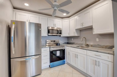 Walking distance to House of Worship remodeled 2nd floor condo on Kings Point Golf -Flanders Way in Florida - for sale on GolfHomes.com, golf home, golf lot
