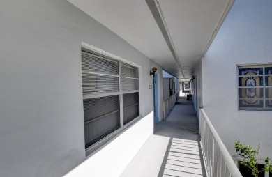 Walking distance to House of Worship remodeled 2nd floor condo on Kings Point Golf -Flanders Way in Florida - for sale on GolfHomes.com, golf home, golf lot