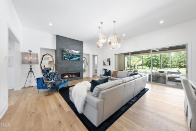 Experience luxury and lifestyle in this exceptional 5-bedroom, 5 on Hasentree Club in North Carolina - for sale on GolfHomes.com, golf home, golf lot