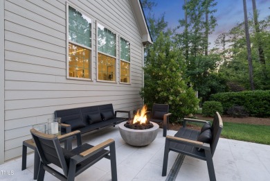 Experience luxury and lifestyle in this exceptional 5-bedroom, 5 on Hasentree Club in North Carolina - for sale on GolfHomes.com, golf home, golf lot