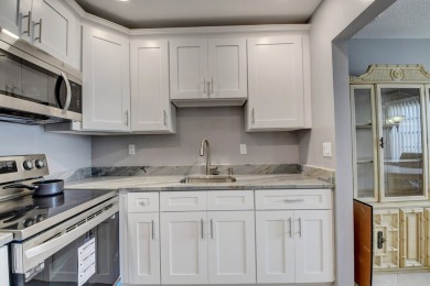 Walking distance to House of Worship remodeled 2nd floor condo on Kings Point Golf -Flanders Way in Florida - for sale on GolfHomes.com, golf home, golf lot