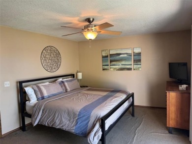 Welcome to Izatys Beach Villa, a 3 bedroom 3 bath retreat on Izatys Golf and Yacht Club in Minnesota - for sale on GolfHomes.com, golf home, golf lot