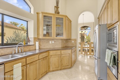 Beautifully remodeled Foothills home featuring travertine floors on The Lodge at Ventana Canyon - Canyon  in Arizona - for sale on GolfHomes.com, golf home, golf lot